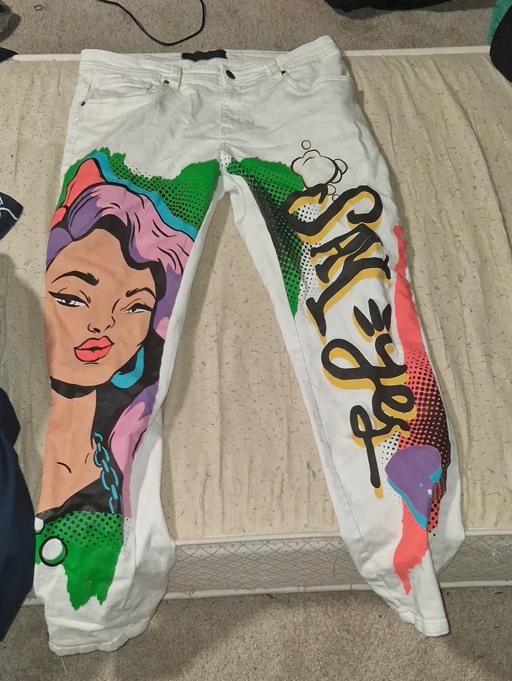 White Mens Graphic Paint-Splatter Jeans with Pop-Art Face